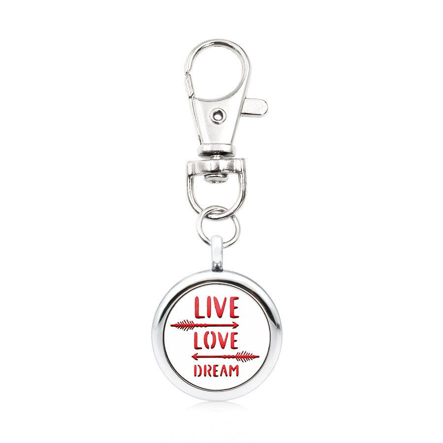 Wholesale Alloy Angel Wings Hollow Aromatherapy Essential Oil Keychain